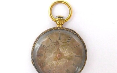POCKET WATCH in 18K yellow gold, round dial, Roman numerals, flower decoration. Reverse side finely cidered with plant decoration. Dimaeter: 3 cm. Gross weight : 18.71 gr. A yellow gold pocket watch.