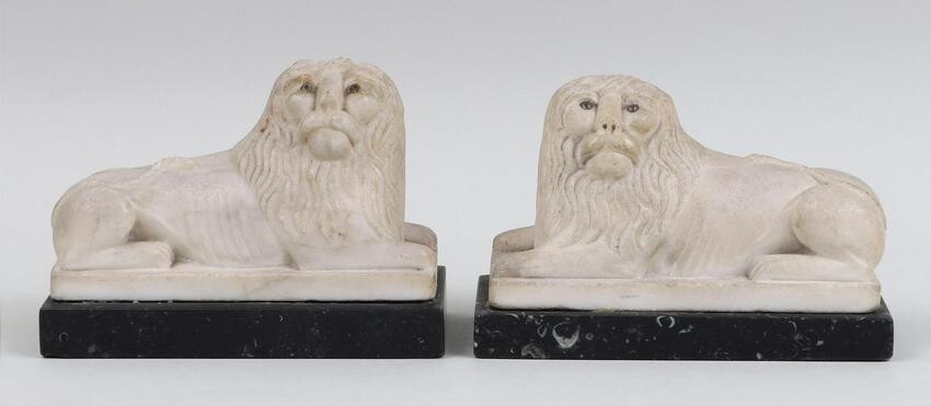 Pair of 19th century alabaster lion garnitures