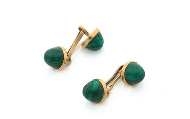Pair of cufflinks of round shape in 18K yellow gold (750‰) set with malachite cabochons Poids