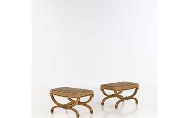 Pair of curule-shaped stools in gilded and carved wood decorated with interlacing friezes and