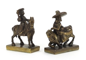 Pair of patinated bronze figures on horseback possibly South...