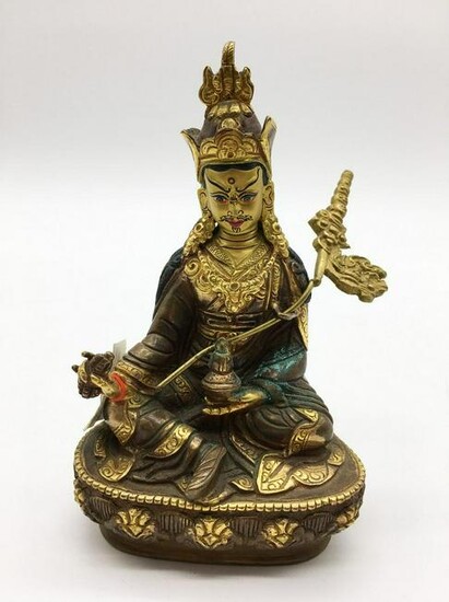 Parcel-Gilt Figure of a Seated Woman