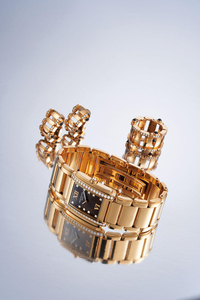 Patek Philippe. A Fine Lady's Pink Gold, Diamond-set Bracelet Watch with Matching Pair of Earring and Ring