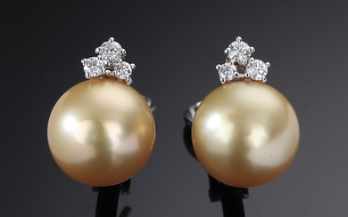 Porta Raselli, Valenza. A pair of South-Sea - and brilliant cultured pearl earrings of 18 kt. white gold. (2)