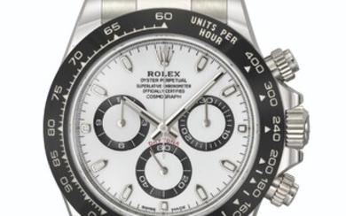 ROLEX. A STAINLESS STEEL AUTOMATIC CHRONOGRAPH WRISTWATCH WITH BRACELET, GUARANTEE AND BOX