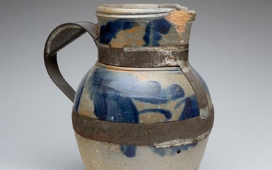 STONEWARE PITCHER WITH MAKE-DO REPAIR.