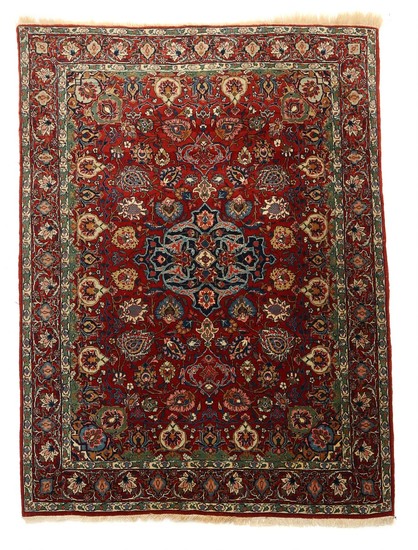 Semi-antique Persian rug, classic medallion design on red base. Circa 1970. 201×142 cm.
