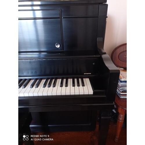 Steinway (c2014) A New York Model 45 upright piano in a sati...