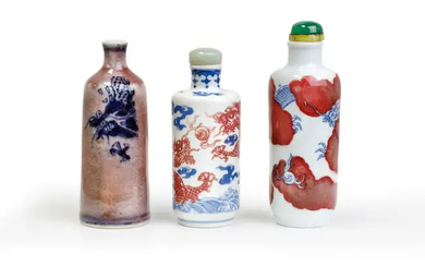 Three Chinese copper-red and blue and white 'dragon' snuff bottles Late Qing...