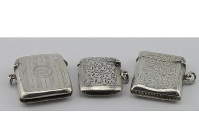 Three silver vesta cases hallmarked Birm. 1900, 1910 & 1915,...