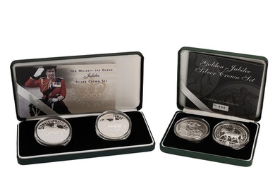 Two (2) silver proof Crown coin sets from The Royal Mint in ...