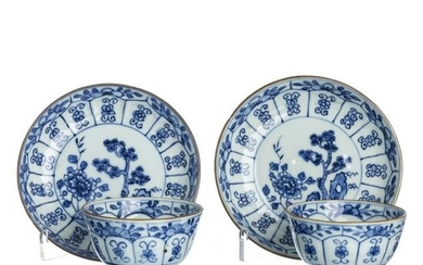 Two Chinese porcelain cups and saucers, Kangxi