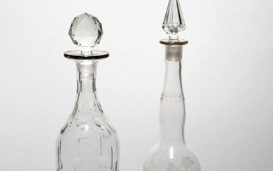 Two small decanters and stoppers mid 19th century, one of...