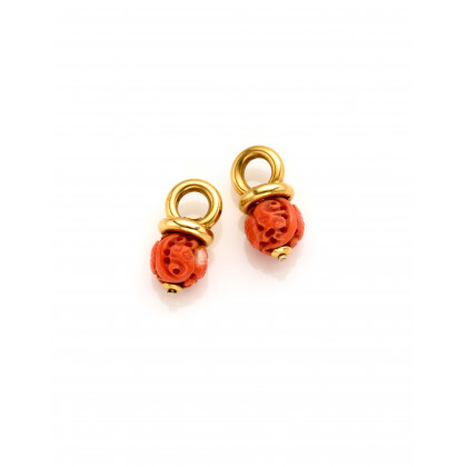 Two yellow gold pendants with carved variegated orange coral, in all g 7.56 circa, length cm 2.50 circa. Marked 179...