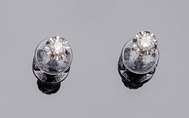 Vintage solitary earrings, in white gold, with a white...