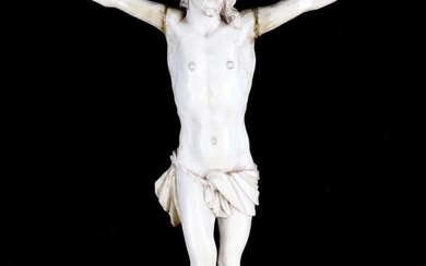 Y A carved ivory Corpus Christi