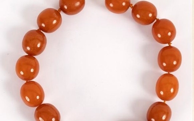 An amber necklace of large slightly oval beads
