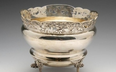 An Edwardian silver fruit bowl of circular form, the