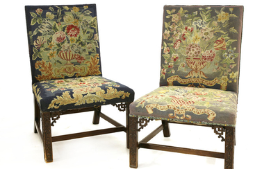 A pair of Chippendale period single library chairs