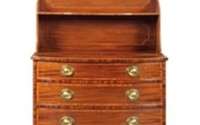 A GEORGE III MAHOGANY SERPENTINE CHEST, BY HENRY KETTLE, CIRCA 1790