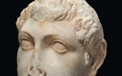 A GREEK MARBLE PORTRAIT HEAD OF PTOLEMY VIII, PTOLEMAIC PERIOD, REIGN OF PTOLEMY VIII, CIRCA 170-116 B.C.