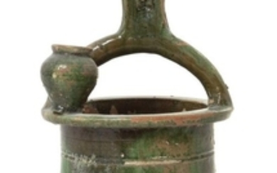 * A Green Glazed Pottery Model of a Well