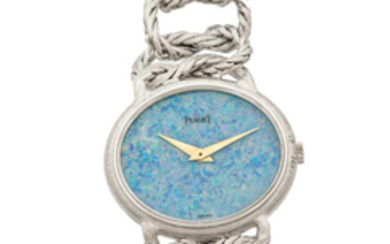 PIAGET LADY'S REF. 9802 OPAL DIAL WHITE GOLD A fine manual-winding 18K white gold lady's wristwatch with opal dial.