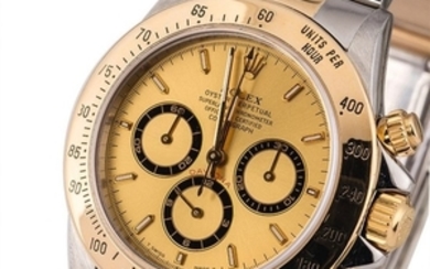 ROLEX | Daytona, Ref. 16523, A Stainless Steel and Yellow Gold Chronograph Wristwatch with Bracelet, Circa 1995
