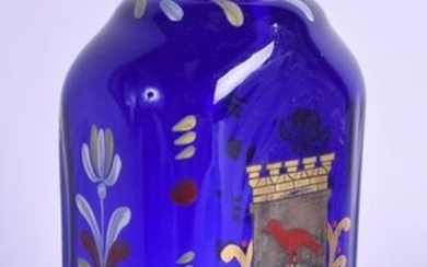 A VINTAGE SWEDISH ENAMELLED BLUE GLASS BOTTLE decorated