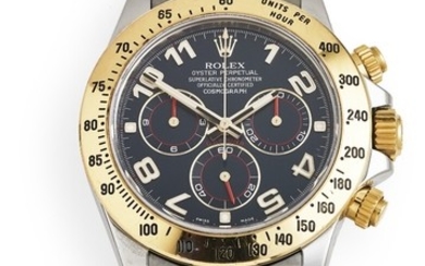 Rolex: A gentleman's wristwatch of 18k gold and steel. Model Daytona, ref. 116523. Mechanical COSC chronograph movement with automatic winding. 2014.