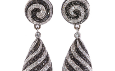 A Pair of Spiral Black & White Diamond Earrings