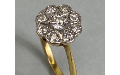 18ct yellow gold daisy cluster ring set with 9 diamonds in w...