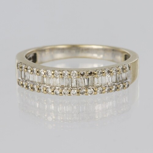 18ct yellow gold diamond set band ring comprising a centre r...