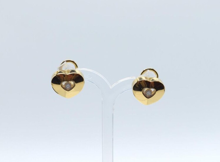 2 earrings in 18 ct yellow gold signed CHOPARD set with 2 brilliants +/- 0.12 ct - 15.3 g raw + original box