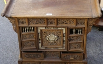 A Chinese Huanghuali style hardwood cabinet on stand,...