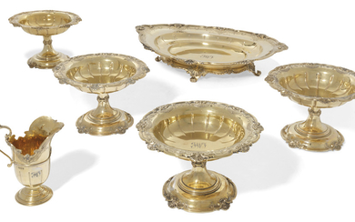 A GEORGE V SILVER-GILT SIX-PIECE TABLE GARNITURE, MARK OF THE GOLDSMITHS AND SILVERSMITHS COMPANY LIMITED, LONDON, 1920