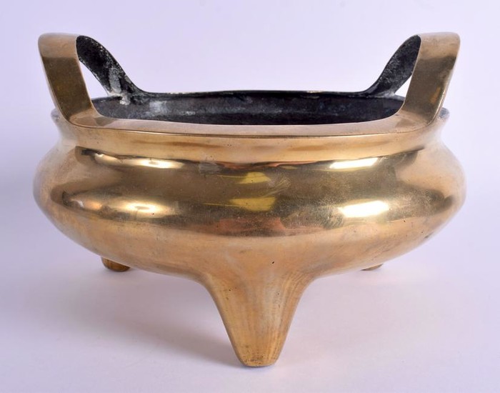 A 19TH CENTURY CHINESE TWIN HANDLED BRONZE CENSER