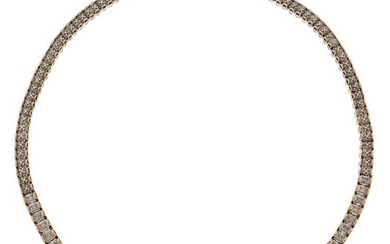 A 9ct gold, flexible diamond necklace, composed of a single row of pavé set single-cut diamonds within shaped gold border, each measuring approx. 0.04ct, to a section with studded links, approx. length 45cm