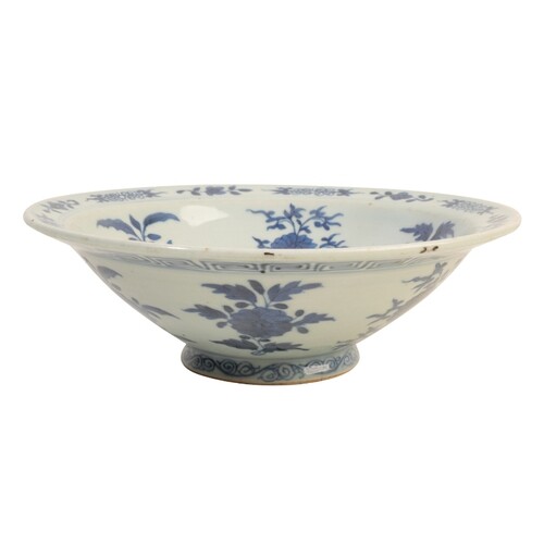 A CHINESE BLUE AND WHITE BOWL with heaped and piled decorati...