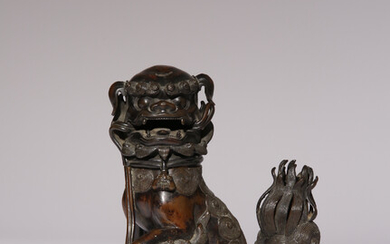 A CHINESE BRONZE 'LION DOG' INCENSE BURNER AND COVER