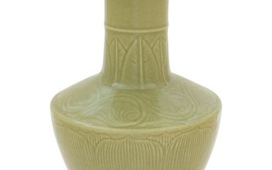 A Celadon Glazed Incised Vase Height 11 1/4 in., 28.6
