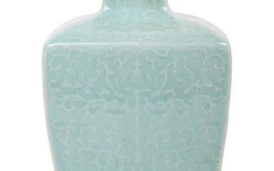 A Chinese Carved Celadon Glazed Porcelain 'Lotus' Vase