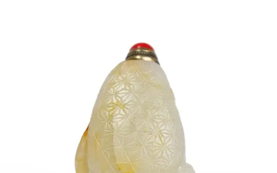 A Chinese pale green and russet jade 'lychees' snuff bottle Qing dynasty,...