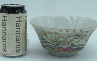 A Chinese porcelain Famille Rose bowl decorated with calligraphy and a walled city 8 x 17 cm.