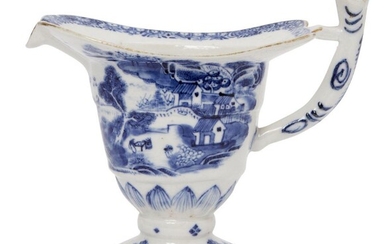 A Chinese porcelain helmet-shaped ewer, Qianlong period, painted in underglaze...