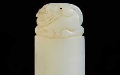 A Chinese white jade beast seal, 19th century