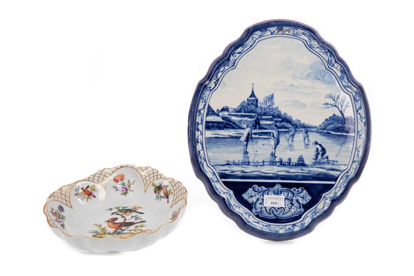 A DUTCH BLUE & WHITE OVAL SHAPED WALL PLAQUE AND A MEISSEN STYLE DISH