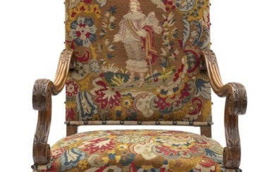 A FRENCH LOUIS XIII STYLE WALNUT ARMCHAIR WITH ORIGINAL TAPESTRY UPHOLSTERY. SEAT HEIGHT 44CM.