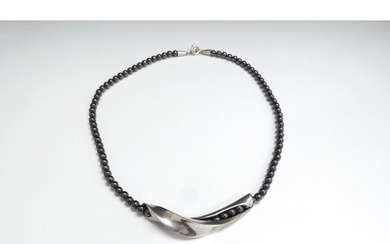 A Georg Jensen silver and hematite bead necklace by Hans Han...