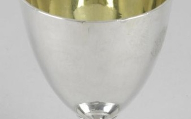 A George III silver goblet, the plain tapering bowl